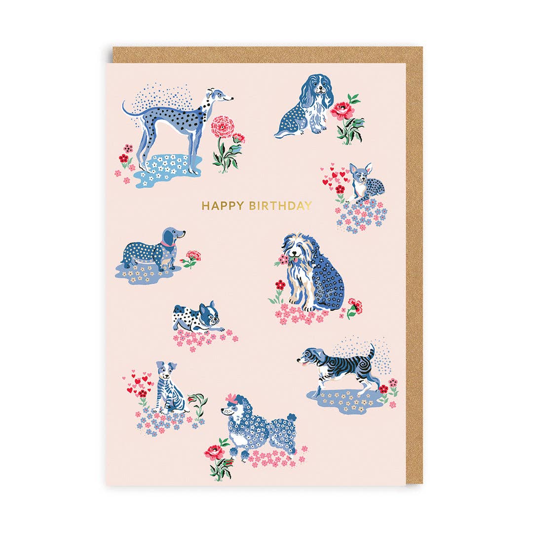 Geburtstagskarte mit Umschlag. Vorne sind mehrere gezeichnete Hunde in blau mit Blumen zu sehen und die Aufschrift "Happy Birthdayt"