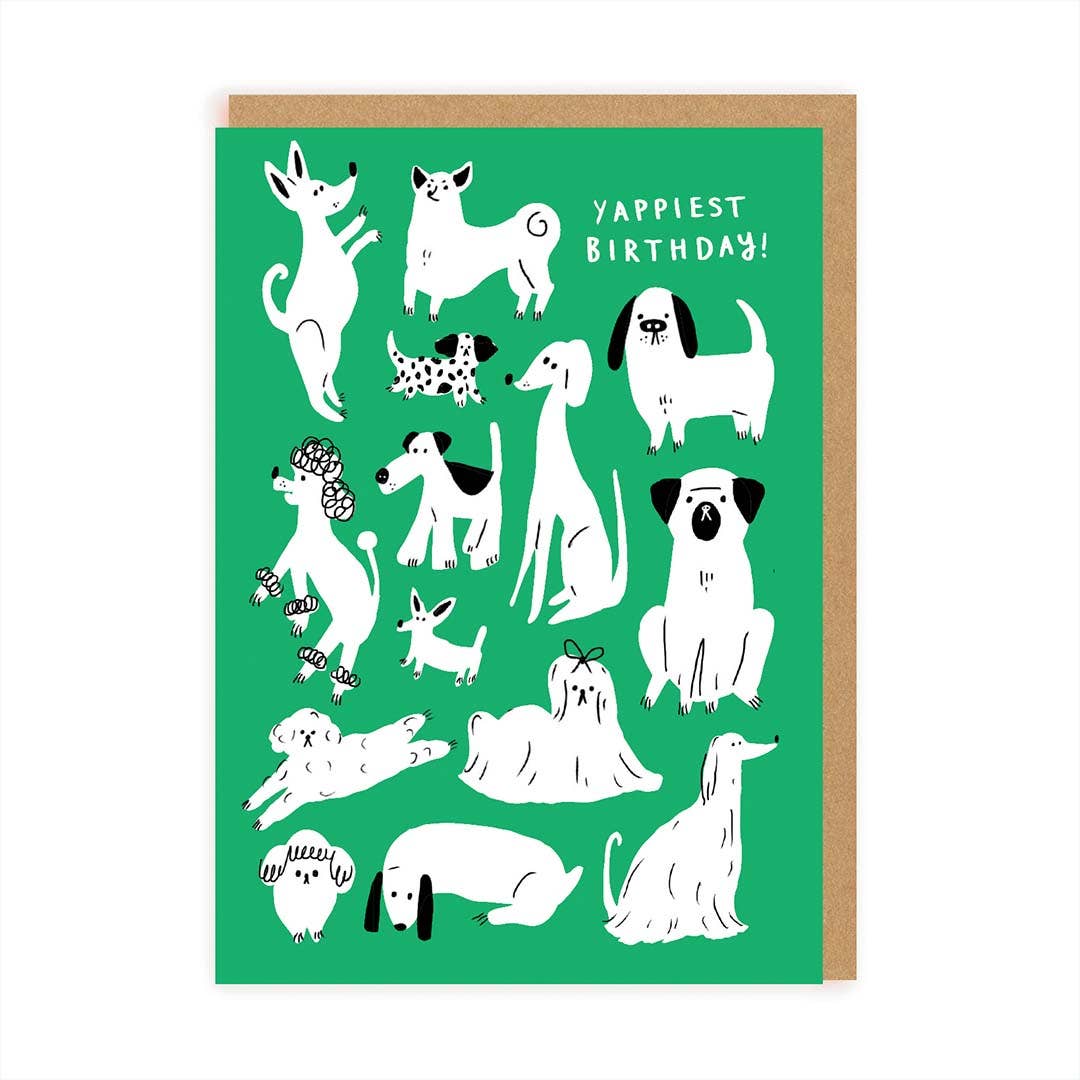 Geburtstagskarte mit Umschlag. Vorne sind mehrere gezeichnete Hunde zu sehen auf grünem Untergrund und der Aufschrift "Yappiest Birthday"