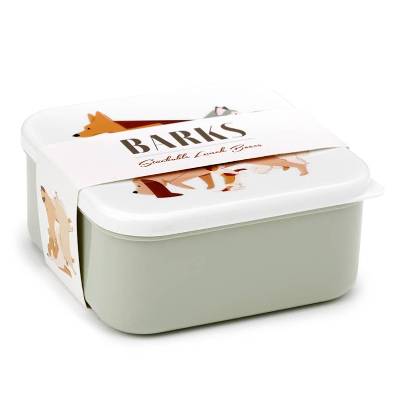 Eine Lunchbox in hellen Farben mit Banderole. auf dem Deckel sind Hund abgebildet.